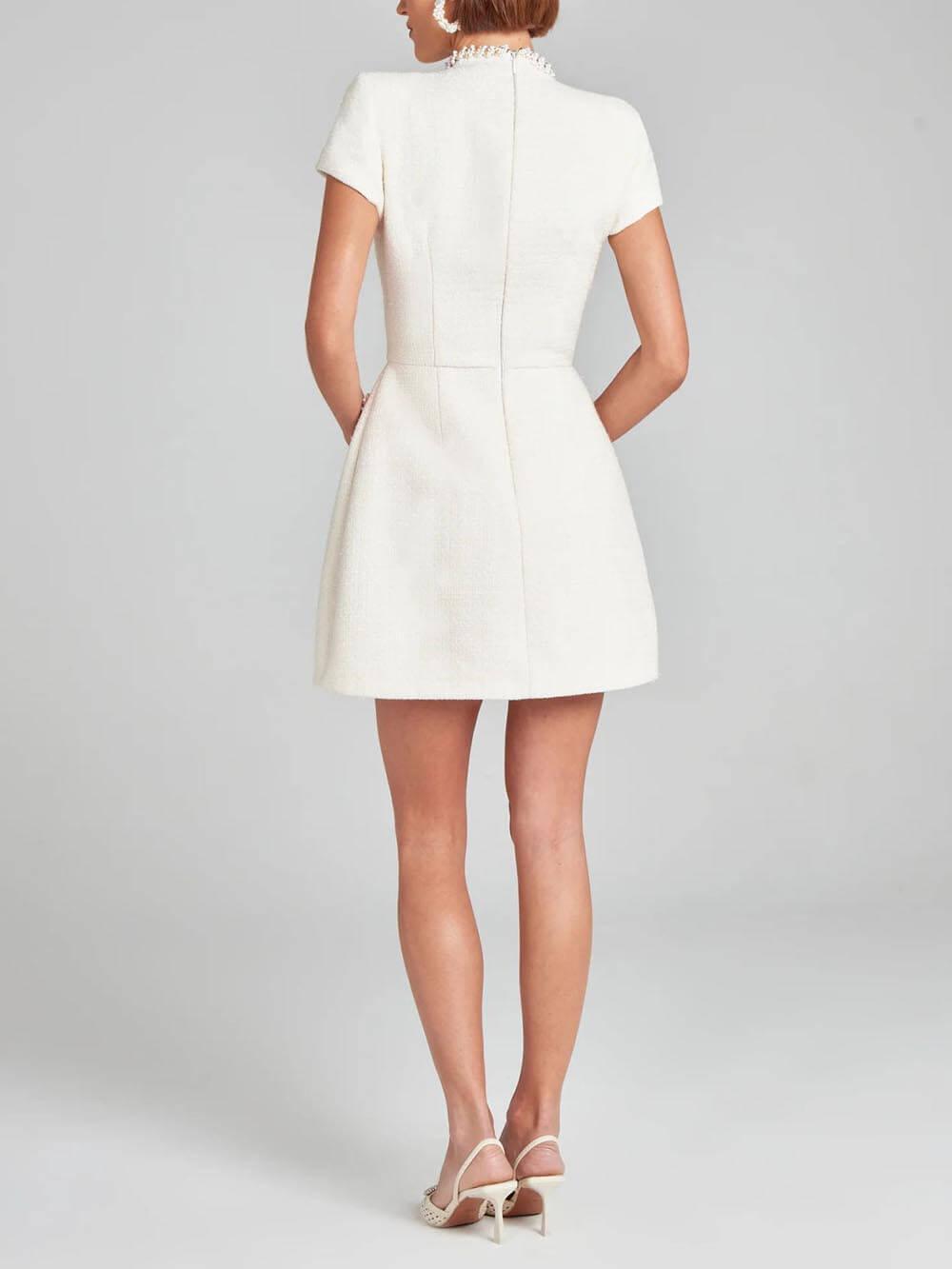 Exquisite and Playful Pearl-Trim Pocket Mini Dress