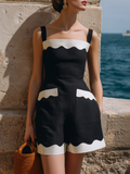 Black Elegant Vacation Shorts Jumpsuit with Contrasting White Wave Accents