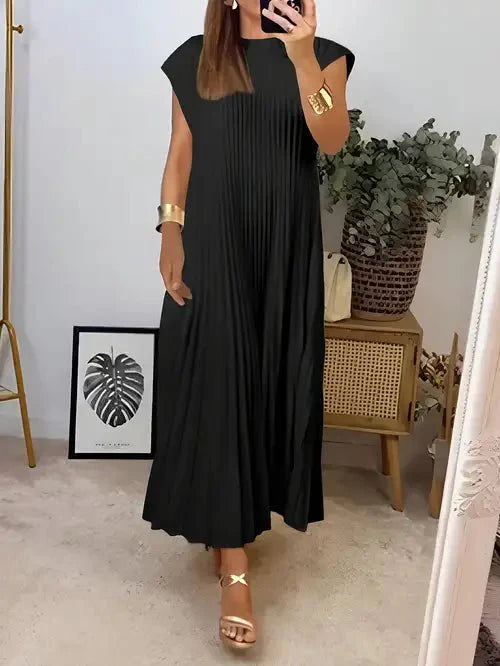 SIMONE | LIGHT AND REFINED PLEATED DRESS - Rossis Family Boutique Miami