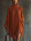Loose orange corduroy dress with fringed hem and high neck
