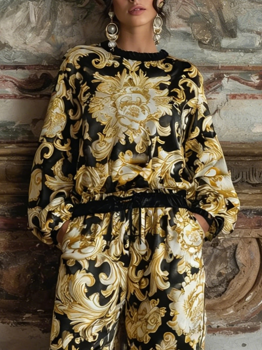Complete your loungewear collection with this elegant Baroque floral print set, including a long-sleeved top and wide-leg trousers.