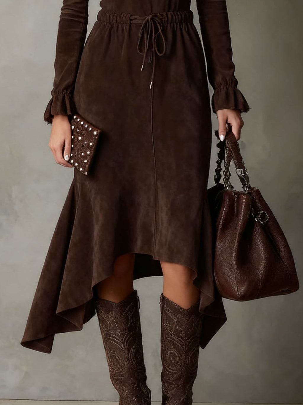 Elegant dark brown suede midi dress with drawstring and asymmetrical hem