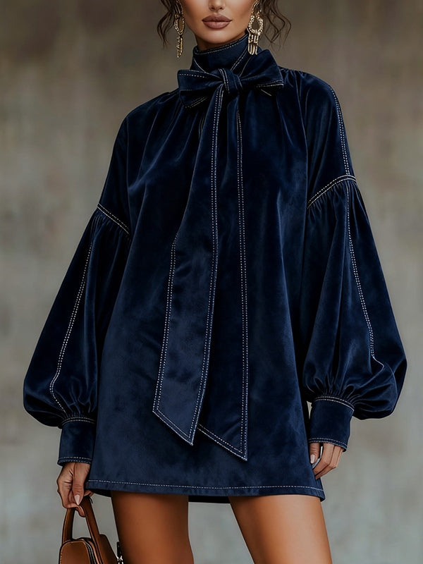 Mini dress in dark blue velvet with bow and lantern sleeves