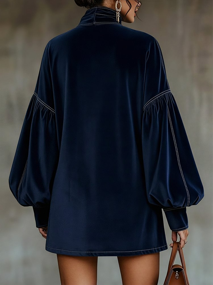 Mini dress in dark blue velvet with bow and lantern sleeves