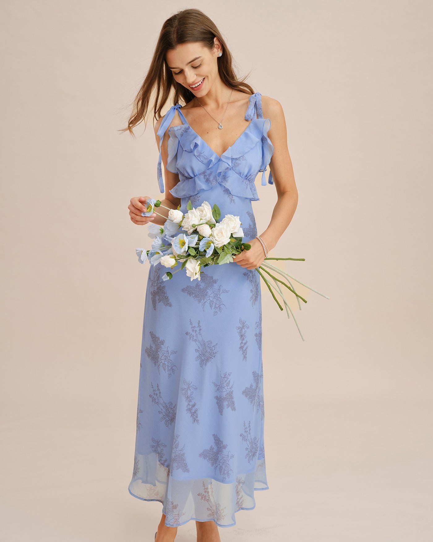 Blue Floral Maxi Dress with Ruffles and Bow Straps